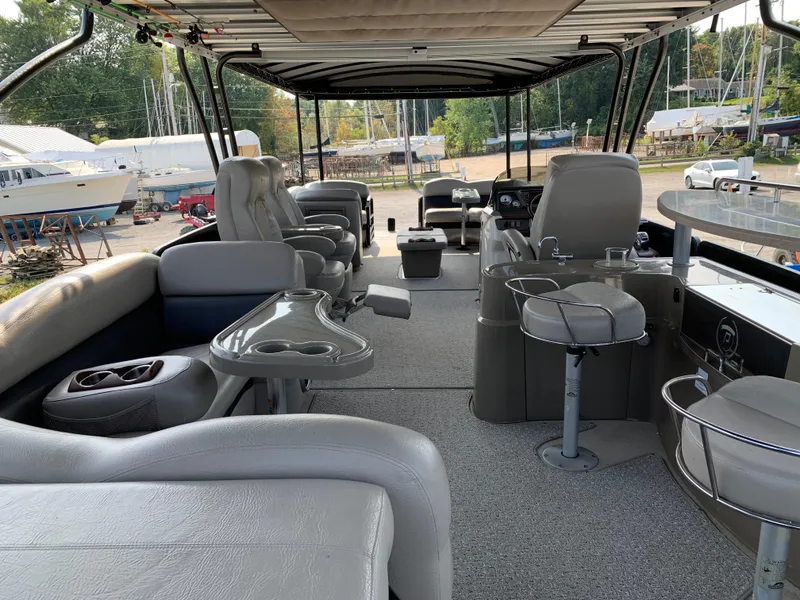 Slide: The Image of Interior of 2013 Premier 310 Boundary Waters Sky Dek pontoon boat with luxurious seating. - 10