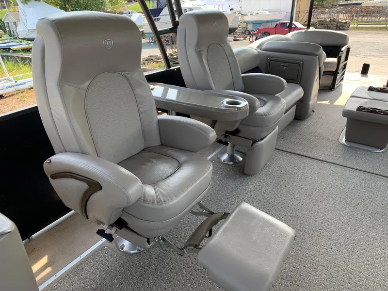 Slide: The Image of Luxurious seating on 2013 Premier 310 Boundary Waters Sky Dek boat. - 14