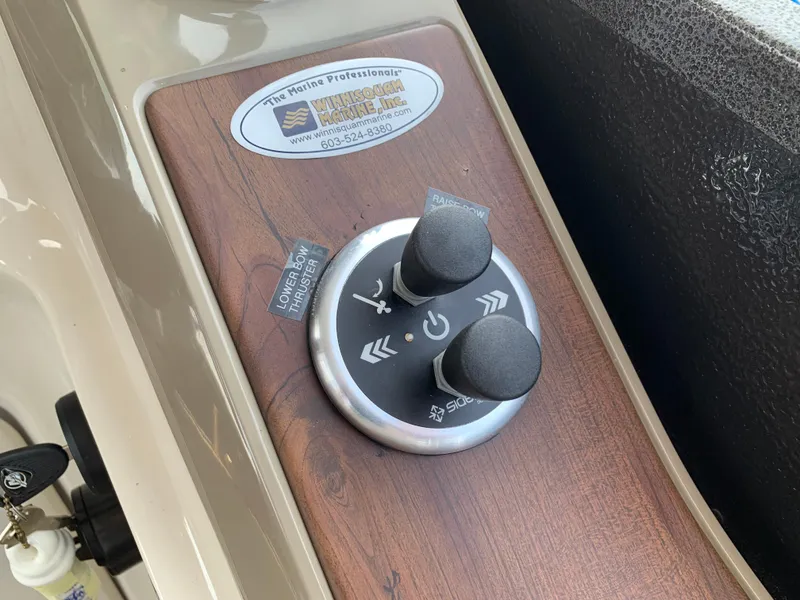 Slide: The Image of Control panel of 2013 Premier 310 Boundary Waters Sky Dek boat. - 21