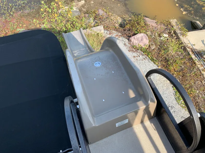 Slide: The Image of 2013 Premier 310 Boundary Waters Sky Dek boat slide, dockside view. - 31