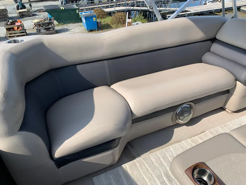 Slide: The Image of 2013 Premier 310 Boundary Waters Sky Dek boat interior with beige seating. - 34