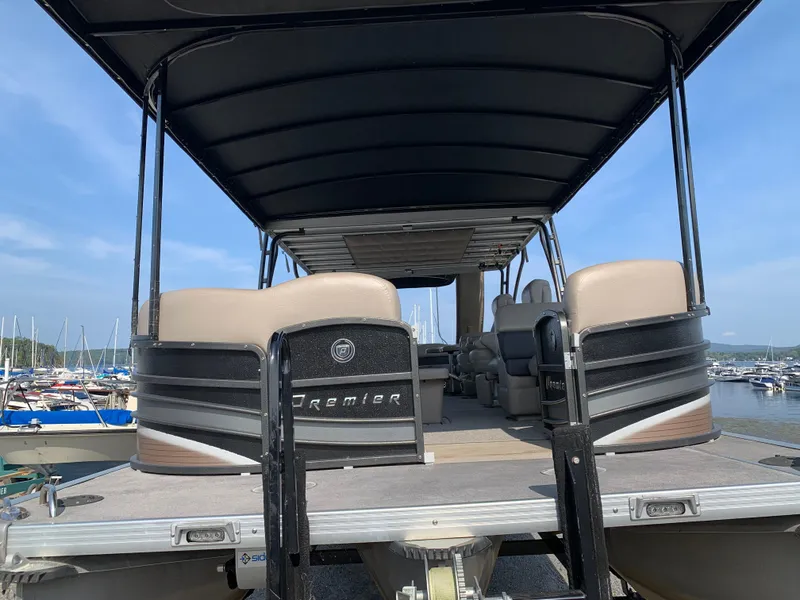 Slide: The Image of 2013 Premier 310 Boundary Waters Sky Dek pontoon boat at marina. - 4