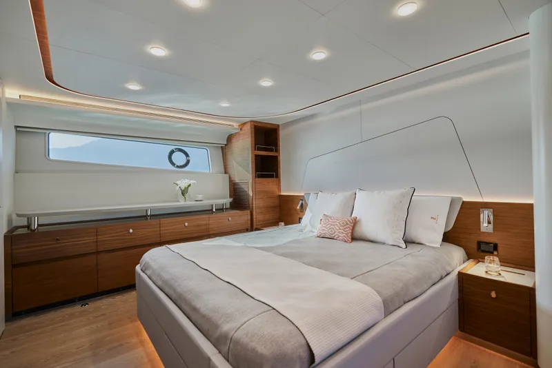 Slide: The Image of Luxurious 2024 CL Yachts CLB65 bedroom with modern design and elegant wood accents. - 22