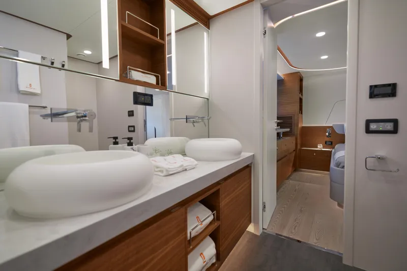 Slide: The Image of Luxurious bathroom interior of 2024 CL Yachts CLB65, featuring modern fixtures and elegant design. - 23