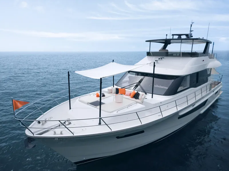 Slide: The Image of 2024 CL Yachts CLB65 luxury yacht cruising on open sea with modern design. - 9