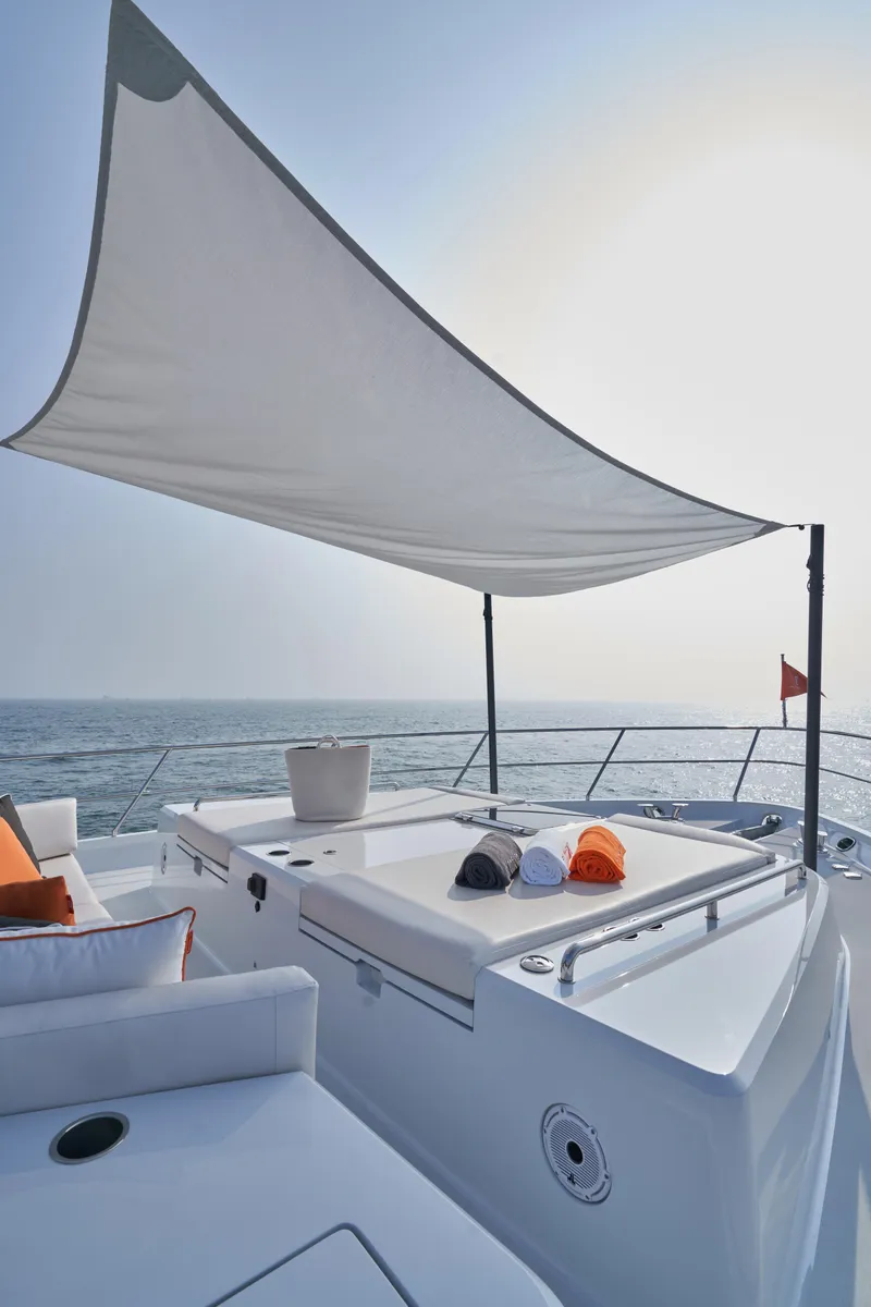 Slide: The Image of 2024 CL Yachts CLB65 luxury yacht deck with sunshade and ocean view. - 15