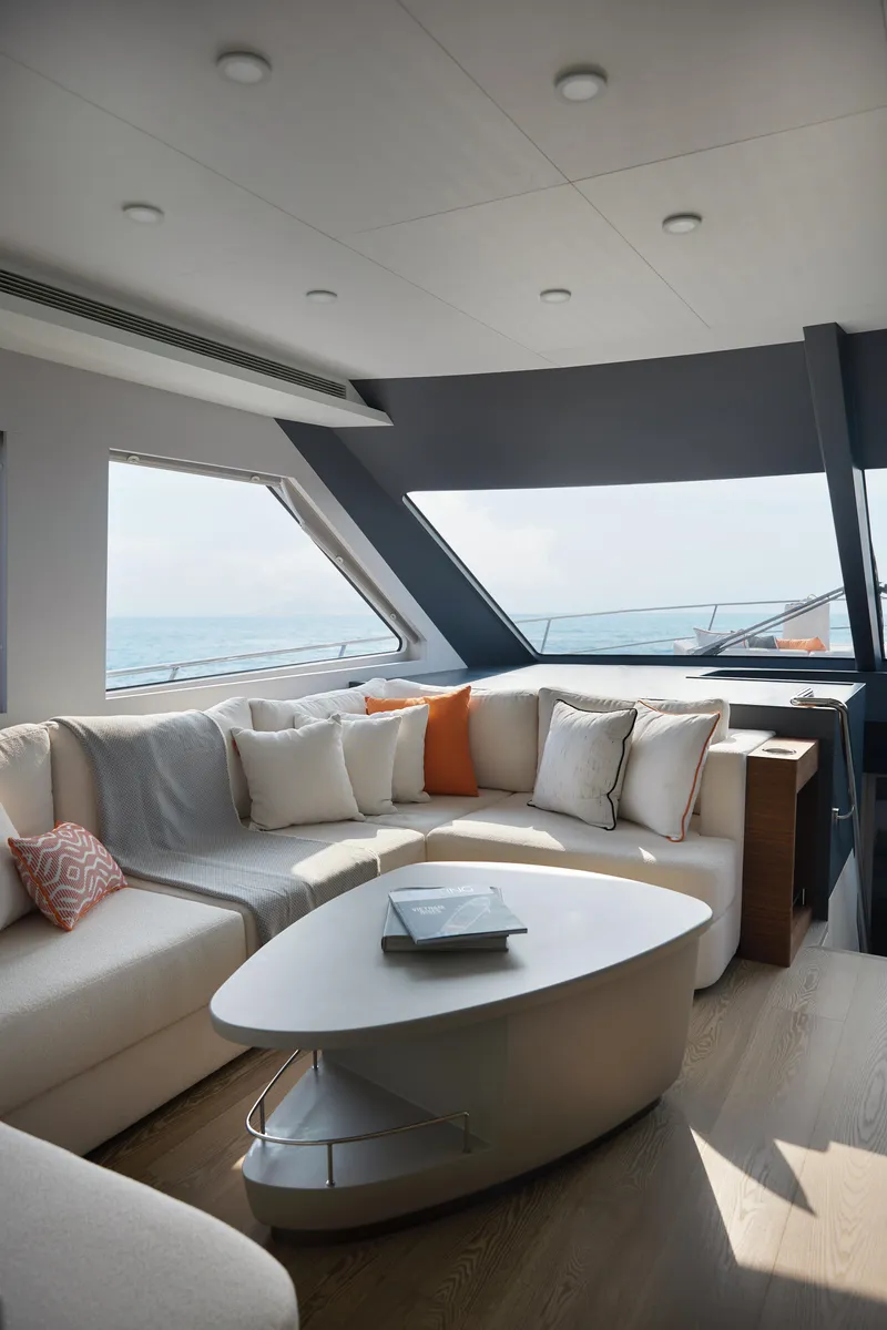 Slide: The Image of Luxurious interior of 2024 CL Yachts CLB65 with modern seating and ocean view. - 18
