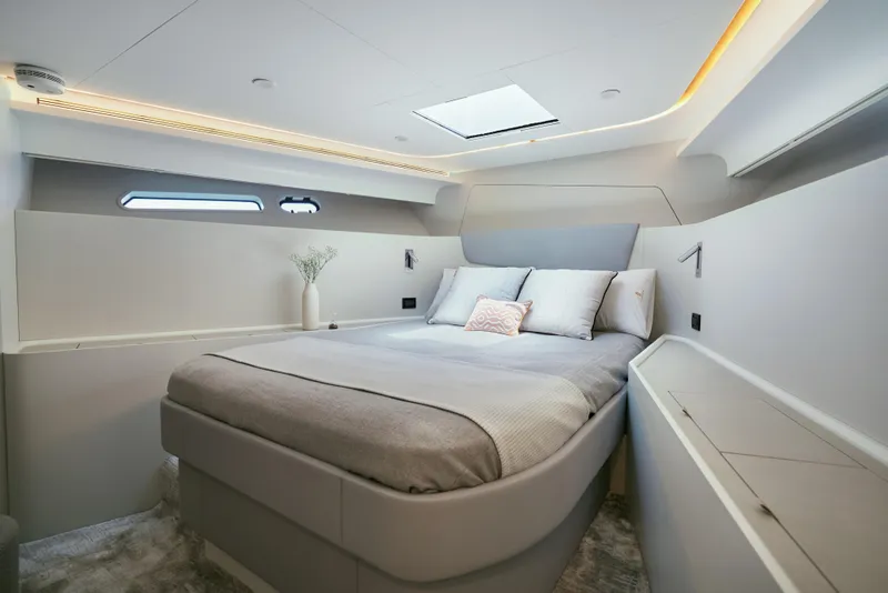 Slide: The Image of Luxurious bedroom interior of 2024 CL Yachts CLB65, featuring modern design and elegant lighting. - 25