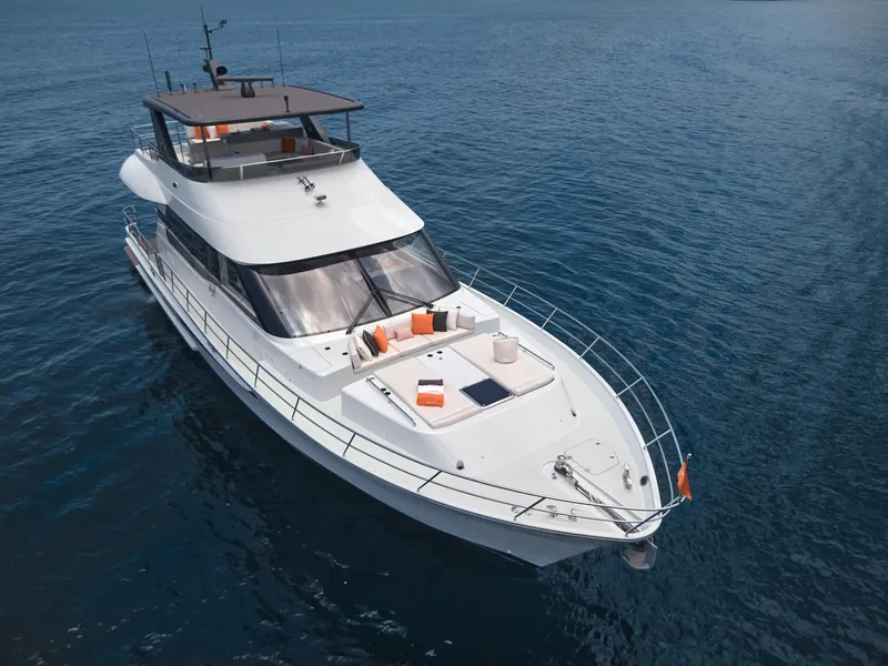 Slide: The Image of 2024 CL Yachts CLB65 luxury yacht cruising on open water. - 8