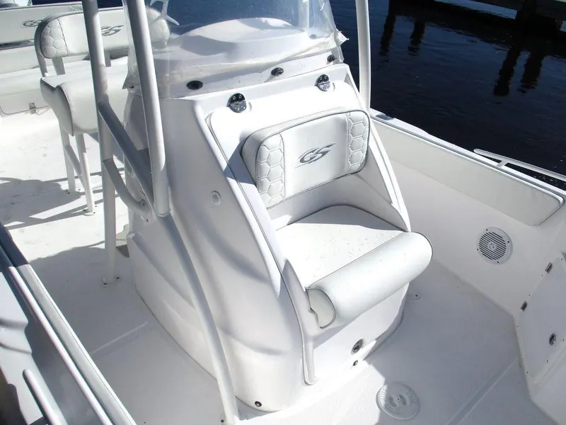 Slide: The Image of 2024 Glasstream 240 CCX boat interior with white seating and console. - 8