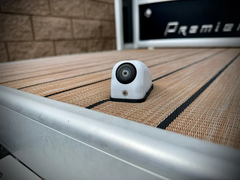 Slide: The Image of Close-up of a 2019 Premier Accolade 310 boat deck with a mounted camera. - 11