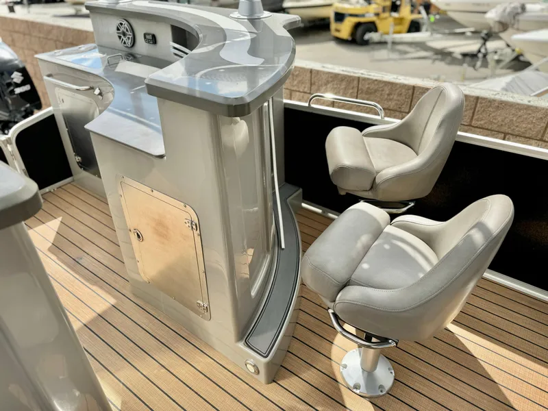 Slide: The Image of Premier Accolade 310 boat interior with bar and swivel chairs, 2019 model. - 18