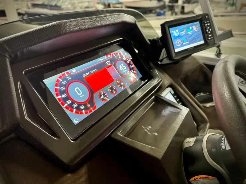 Slide: The Image of Dashboard of 2019 Premier Accolade 310 with digital displays and navigation system. - 22