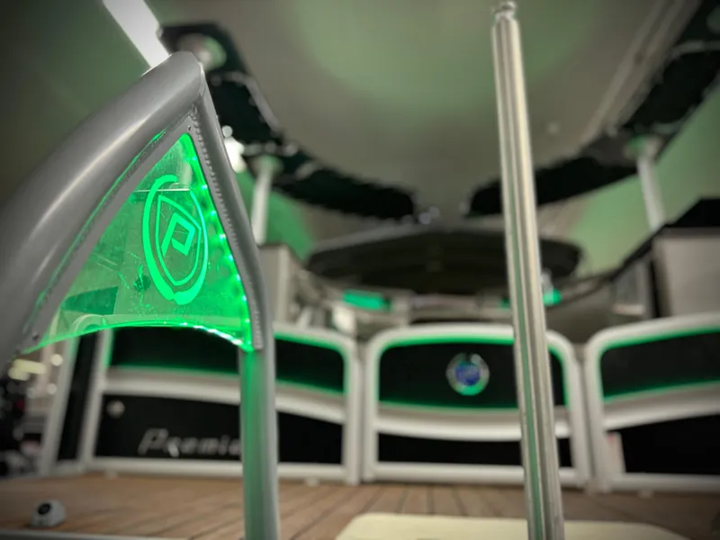 Slide: The Image of 2019 Premier Accolade 310 boat interior with green LED lighting. - 37