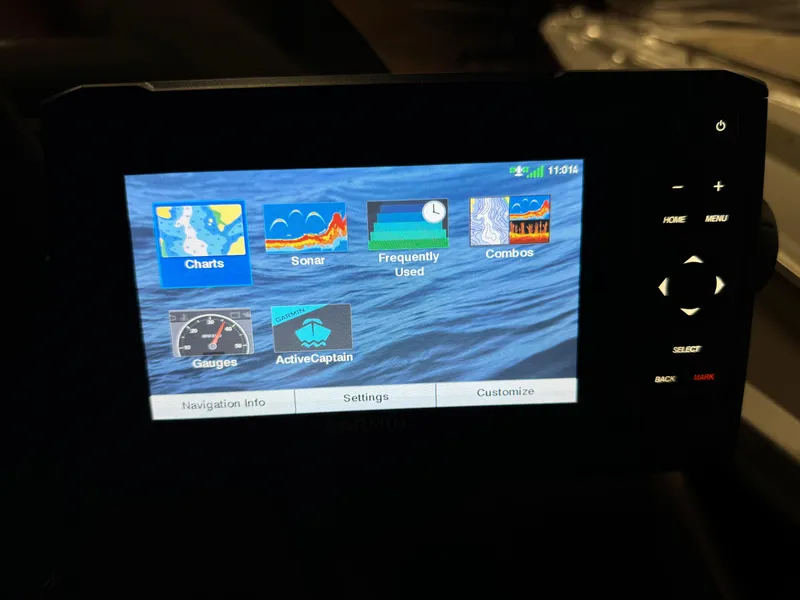Slide: The Image of Premier Accolade 310 display showing navigation and sonar features, 2019 model. - 45