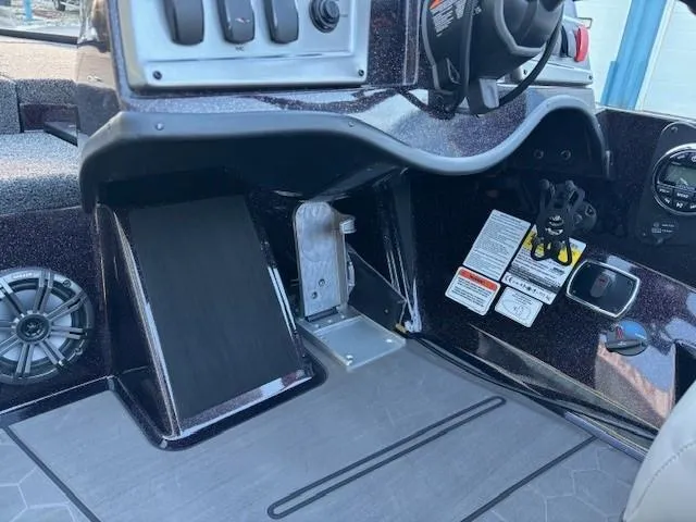 Slide: The Image of Nitro Z19 Pro 2025 boat dashboard with controls and foot pedal. - 11