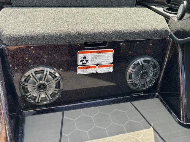 Slide: The Image of Nitro Z19 Pro 2025 boat interior with dual speakers and safety labels. - 12