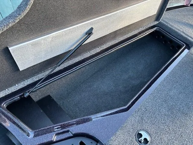 Slide: The Image of Open storage compartment in 2025 Nitro Z19 Pro boat. - 7