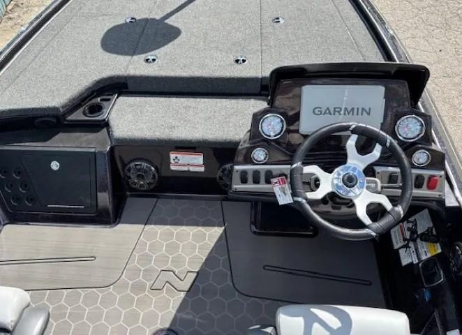 Slide: The Image of Nitro Z19 Pro 2025 boat dashboard with Garmin navigation system and modern controls. - 8