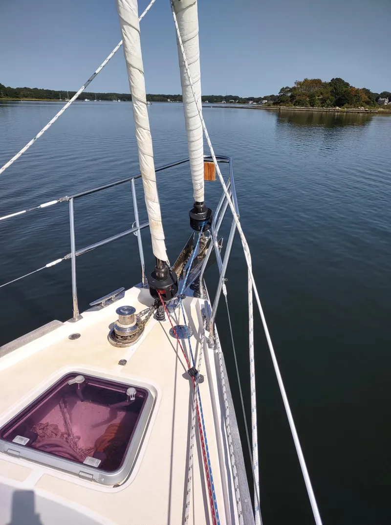 Slide: The Image of Sailboat deck view on calm water, Outbound 46, 2007 model. - 16