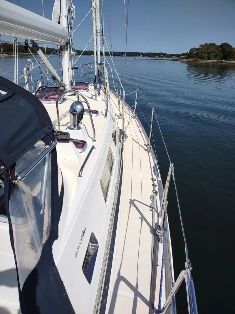 Slide: The Image of Sailing yacht Outbound 46, 2007 model, cruising on calm waters under clear skies. - 19