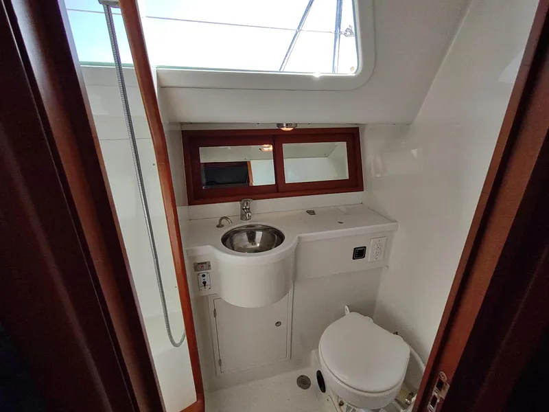 Slide: The Image of Bathroom interior of 2007 Outbound 46 yacht with sink and toilet. - 37