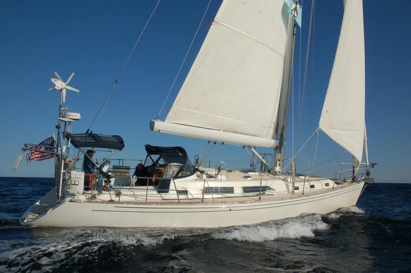 Slide: The Image of Sailing yacht Outbound 46, 2007 model, cruising on open sea with full sails. - 6