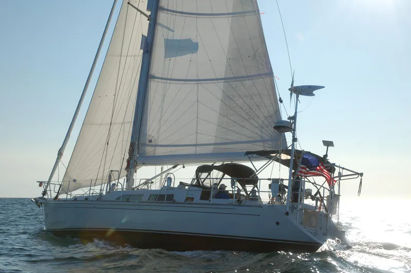 Slide: The Image of Sailing yacht Outbound 46, 2007 model, gliding on open water with full sails. - 7