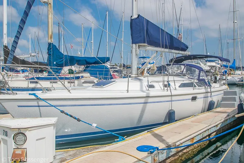 The Image of 2002 Catalina 36 MkII sailboat docked at marina under blue sky. - 1