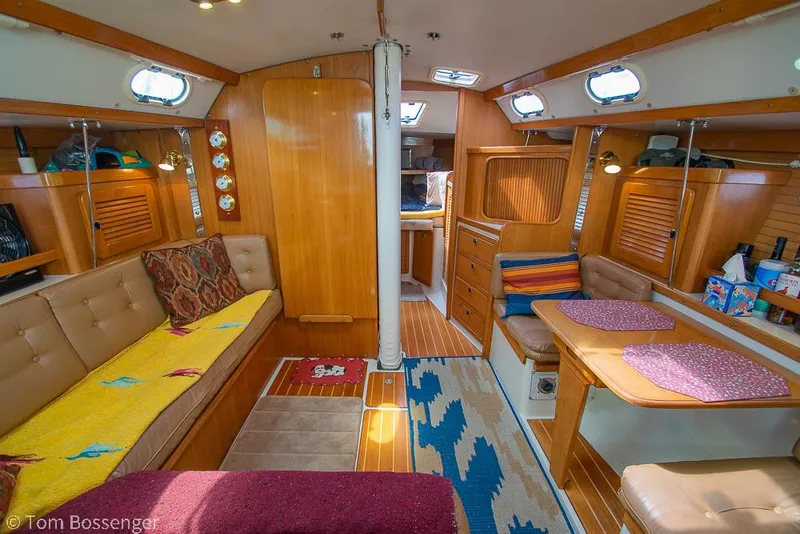 Slide: The Image of Interior of 2002 Catalina 36 MkII sailboat with cozy seating and wooden finishes. - 16