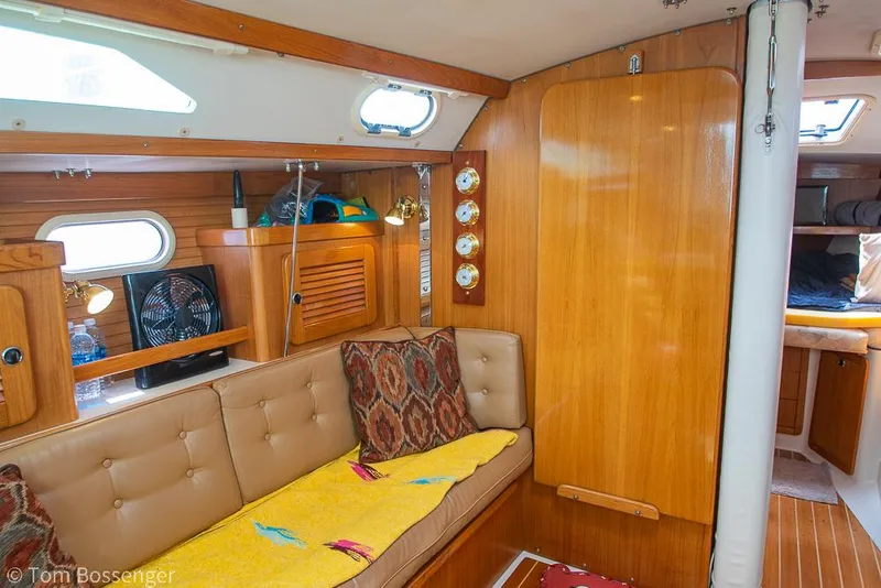 Slide: The Image of Interior of 2002 Catalina 36 MkII sailboat with cozy seating and wooden finishes. - 19