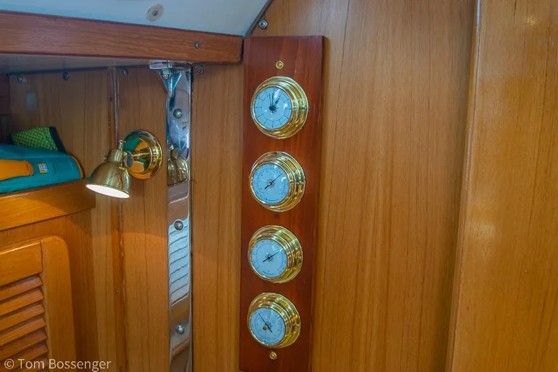 Slide: The Image of Interior of 2002 Catalina 36 MkII yacht with brass instruments and wooden paneling. - 20