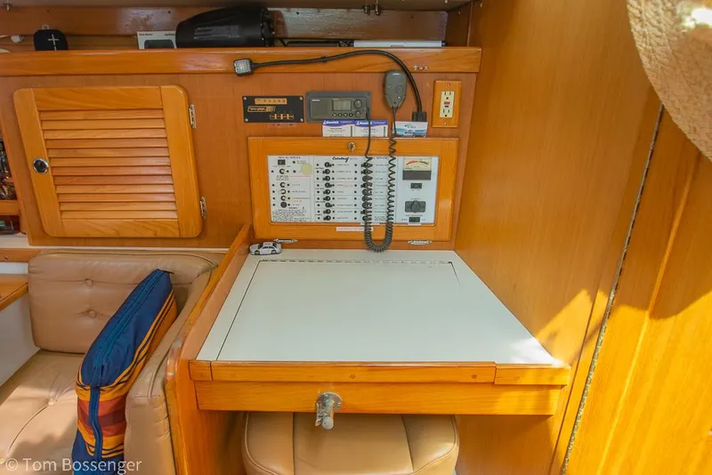 Slide: The Image of Navigation station in 2002 Catalina 36 MkII sailboat with control panel and seating. - 27