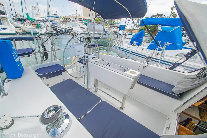 Slide: The Image of Cockpit of a 2002 Catalina 36 MkII sailboat, featuring seating and steering wheel. - 31