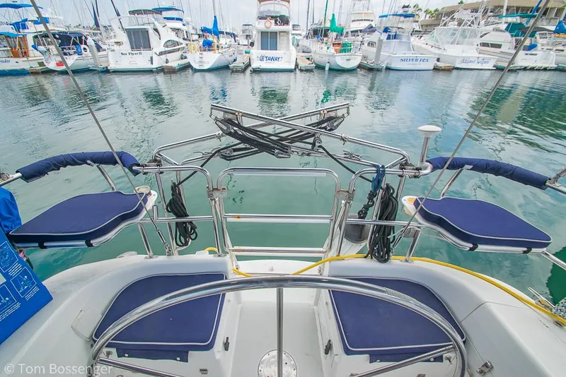 Slide: The Image of 2002 Catalina 36 MkII sailboat cockpit view in marina setting. - 36