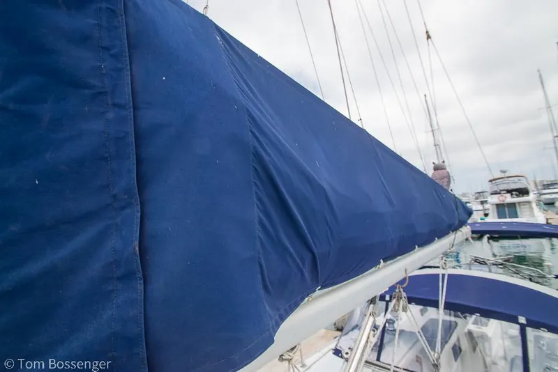 Slide: The Image of Catalina 36 MkII sailboat with blue sail cover, docked in marina, 2002 model. - 46