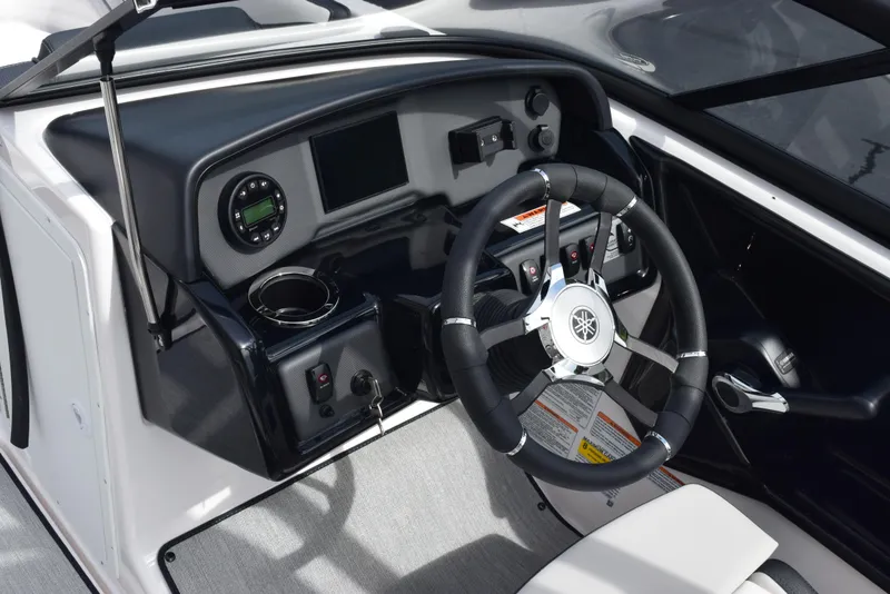 Slide: The Image of 2025 Yamaha Boats AR195 dashboard with steering wheel and control panel. - 10