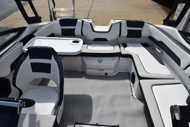 Slide: The Image of 2025 Yamaha Boats AR195 interior with sleek seating and modern design. - 13