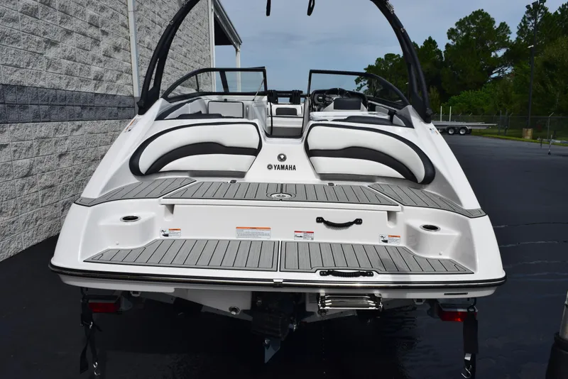 Slide: The Image of 2025 Yamaha Boats AR195, rear view, sleek design, white and gray color scheme. - 4