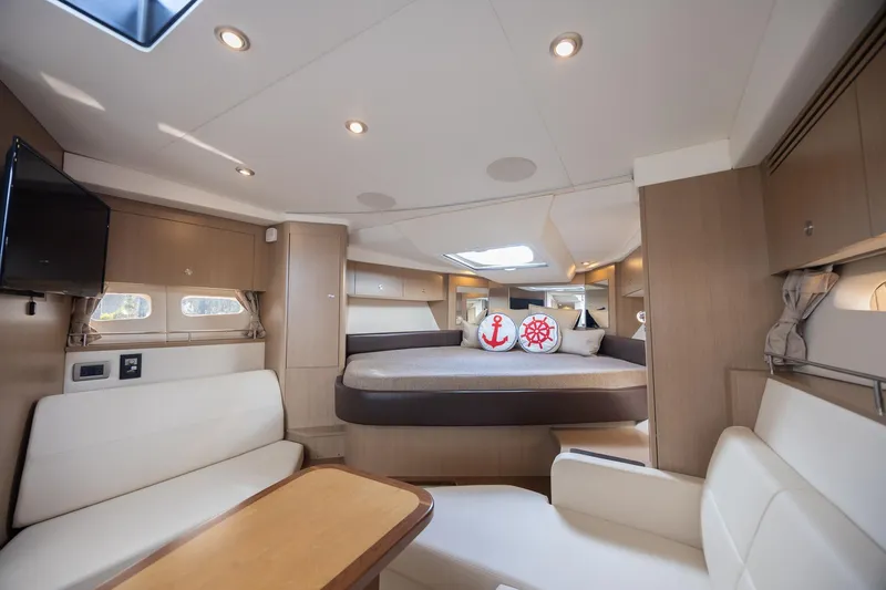 Slide: The Image of Luxurious interior of 2019 Sea Ray Sundancer 350 Coupe with modern furnishings and cozy seating. - 40