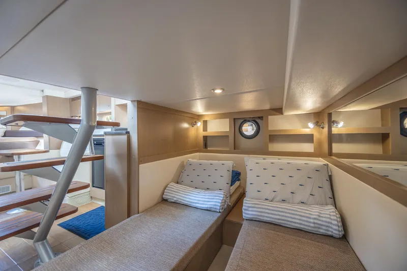Slide: The Image of Interior of 2019 Sea Ray Sundancer 350 Coupe with cozy twin beds and modern design. - 49