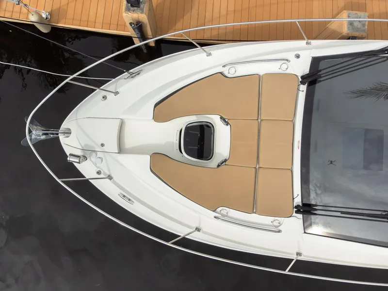 Slide: The Image of 2019 Sea Ray Sundancer 350 Coupe, aerial view of bow and deck. - 7