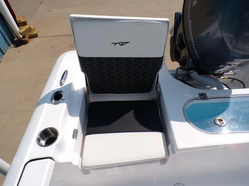 Slide: The Image of Tidewater 1910 Bay Max 2025 boat seat with cup holder and storage compartment. - 16