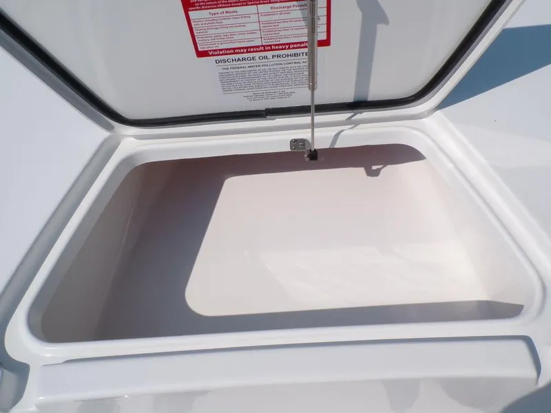 Slide: The Image of Open storage compartment on 2025 Tidewater 1910 Bay Max boat. - 18