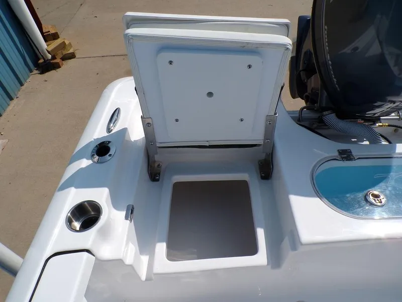 Slide: The Image of Tidewater 1910 Bay Max 2025 boat storage compartment and seating area. - 20