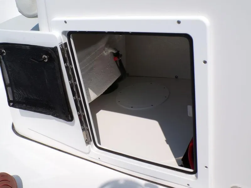 Slide: The Image of Open storage compartment on 2025 Tidewater 1910 Bay Max boat. - 22