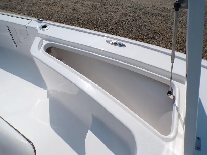 Slide: The Image of 2025 Tidewater 1910 Bay Max boat storage compartment, open and empty. - 8