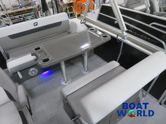 Slide: The Image of 2025 Princecraft Vectra 23 RL pontoon interior with dinette and seating. - 11