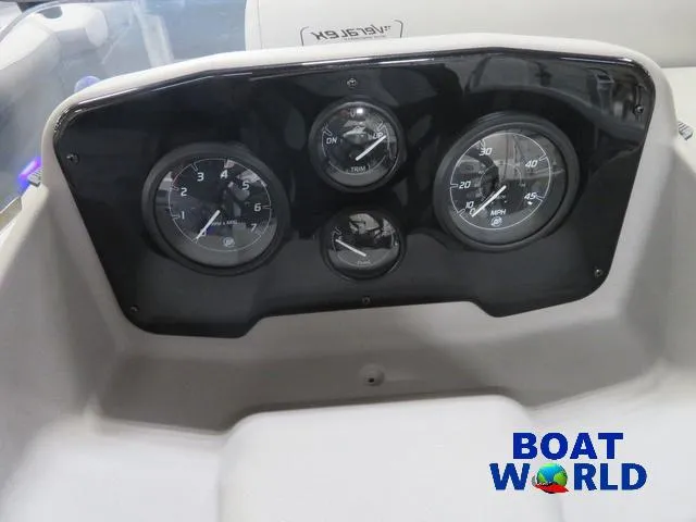 Slide: The Image of 2025 Princecraft Vectra 23 RL pontoon dashboard with gauges, Boat World logo. - 17