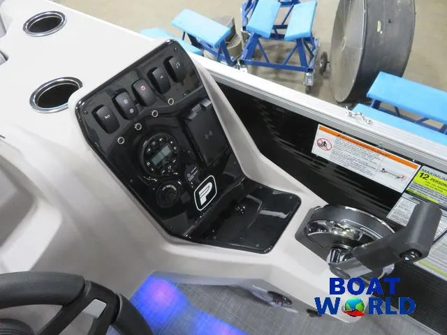 Slide: The Image of 2025 Princecraft Vectra 23 RL pontoon boat control panel with Mercury engine controls. - 18